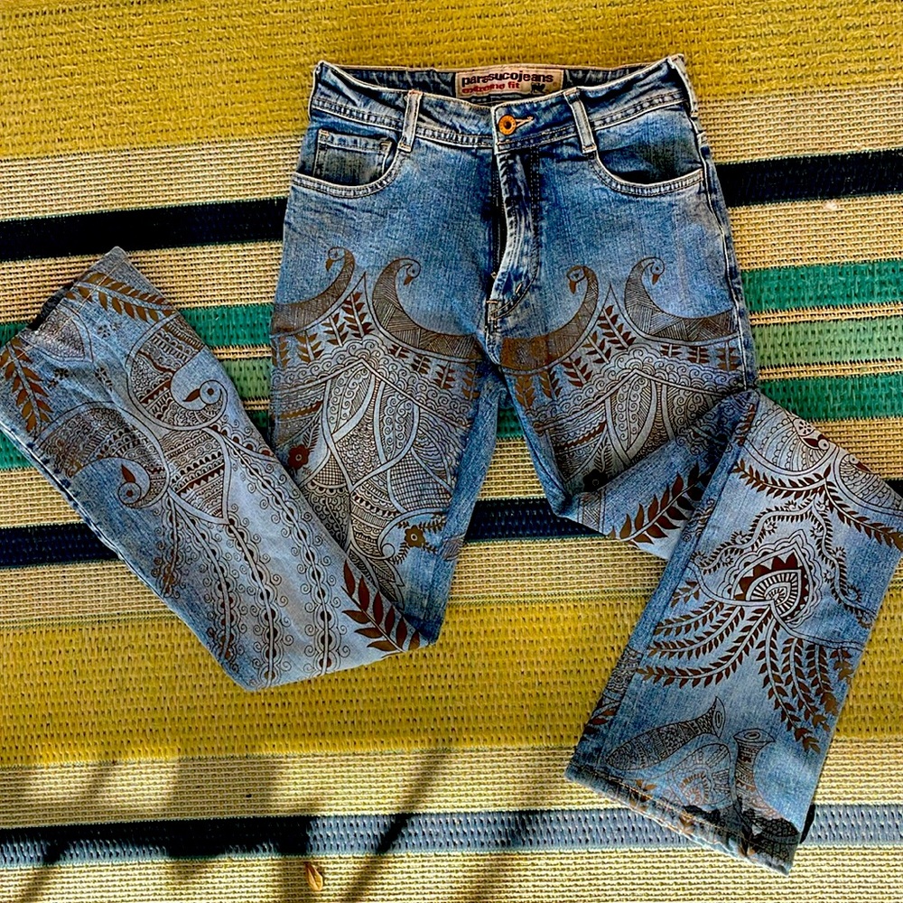 Artistic Blue Jeans with Intricate Patterns